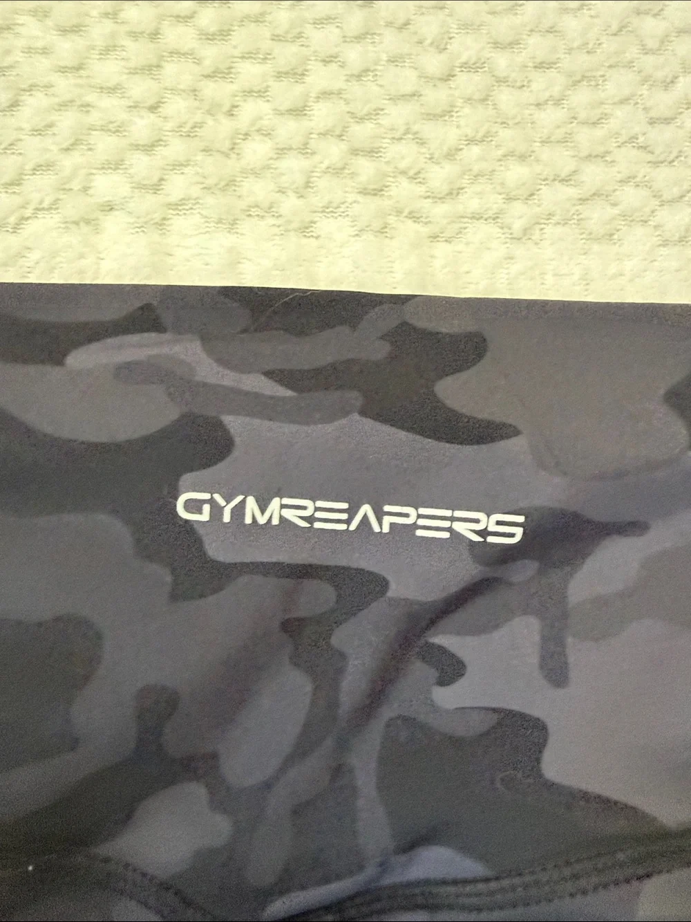 High-Rise Black Camo Bike Shorts with Subtle Skull Accent